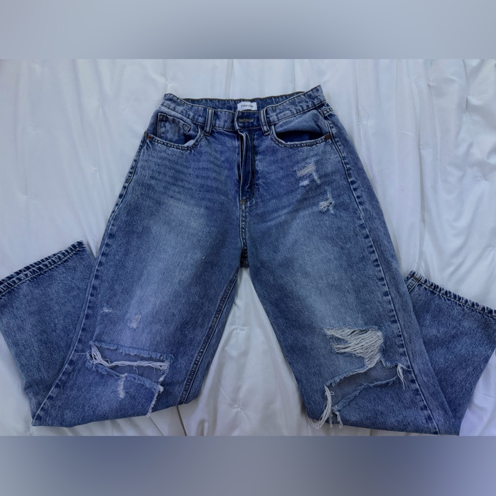 Distressed Blue Jeans